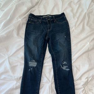 dark blue ripped jeans